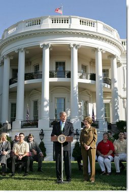 Standing with Mrs. Laura Bush, President George W. Bush addresses military support organizations Tuesday, Sept. 18, 2007, on the South Lawn. I feel a very strong obligation, since it was my decision that committed young men and women into combat, to make sure our veterans who are coming back from Iraq and Afghanistan get all the help this government can possibly provide, said President Bush. White House photo by Chris Greenberg