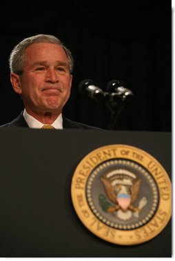 President George W. Bush acknowledges the applause as he attends the 56th National Prayer Breakfast Thursday, Feb. 8, 2008, at the Washington Hilton Hotel. Said the President, "Every President since Dwight Eisenhower has attended the National Prayer Breakfast -- and I am really proud to carry on that tradition. It's an important tradition, and I'm confident Presidents who follow me will do the same. The people in this room come from many different walks of faith. Yet we share one clear conviction: We believe that the Almighty hears our prayers -- and answers those who seek Him." White House photo by Joyce N. Boghosian