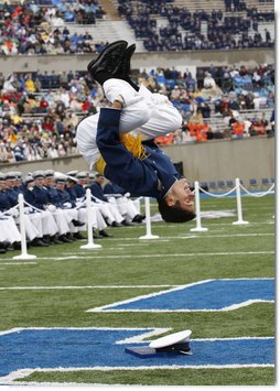 A United States Air Force Academy graduate flips after receiving his diploma during commencement exercises Wednesday, May 28, 2008, in Colorado Springs. White House photo by Eric Draper