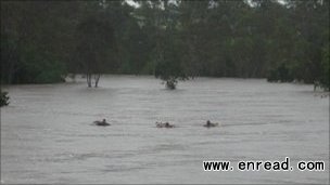 Police earlier found three teenagers who had floated down flooded rivers on airbeds