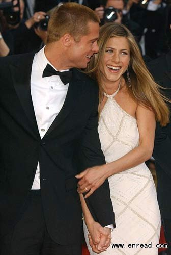 So happy: Brad and Jennifer at the Cannes premiere of Troy in May 2004, a year later they were heading to divorce.