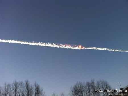 The trail of a falling object is seen above the Urals city of Chelyabinsk February 15, 2013, in this picture.