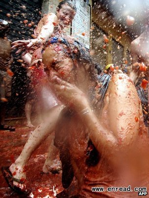 Tourists around the world flock to the tomato-throwing fest in Bunol, Valencia
