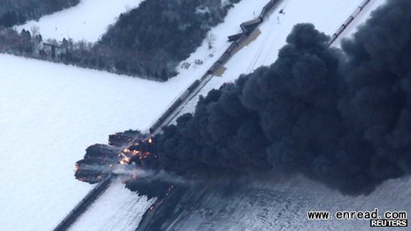 Thick black smoke was pouring from the derailed train