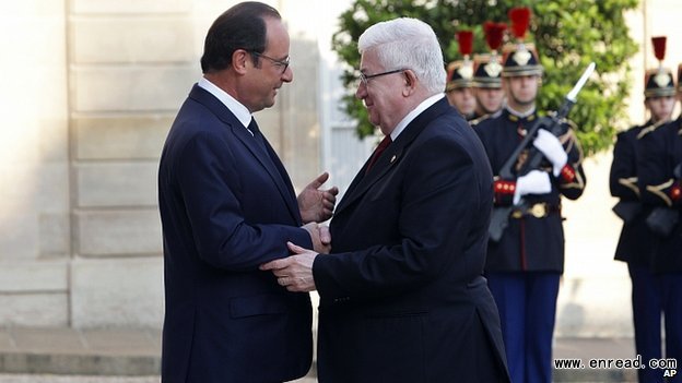 French President Francois Hollande, left, is hosting the talks with Iraqi counterpart Fouad Massoum