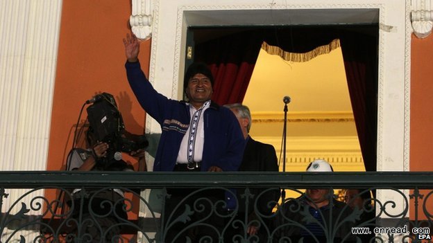 Evo Morales greeted supporters from the balcony of the presidential palace