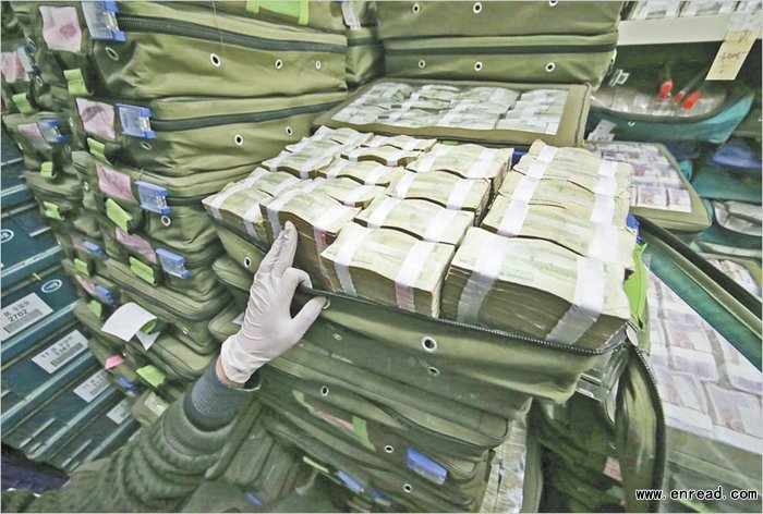 The undated photo shows stacks of old banknotes that have been <a href=