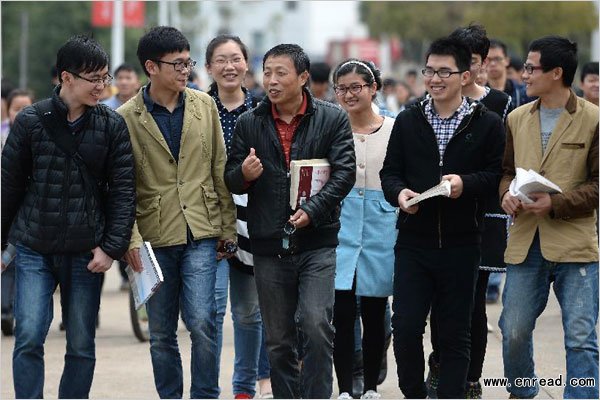 Gan Jubao on the way back to the dormitory with his classmates at the Jiangxi University of Traditional Chinese Medicine on March 18, 2015.