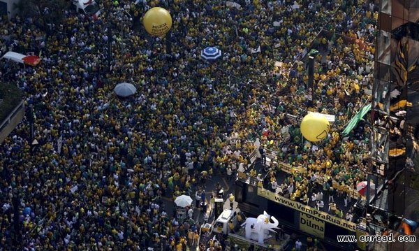 Photo shows people take part in a protest against government corruption in Sao Paulo, Brazil, on Apr. 12, 2015.