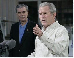 President George W. Bush gestures as he addresses his remarks prior to signing an Executive Order to protect the striped bass and red drum fish populations Saturday, Oct. 20, 2007, at the Chesapeake Bay Maritime Museum in St. Michaels, Md. U.S. Secretary of Commerce Carlos Gutierrez is seen background. White House photo by Eric Draper