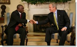 President George W. Bush welcomes President Joseph Kabila of the Democratic Republic of Congo to the Oval Office Friday, Oct. 26, 2007. Among the topics the leaders discussed during the visit were the successes of the newly elected Kabila government and the remaining challenges to a secure and prosperous Congo.  White House photo by Eric Draper