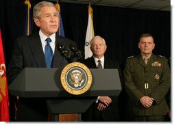 President George W. Bush is joined at the Pentagon Thursday, Nov. 29, 2007, by Secretary of Defense Robert Gates and Gen. James Cartwright, Vice Chairman of the Joint Chiefs of Staff, as he delivers a statement after briefings at the Department of Defense.  White House photo by Chris Greenberg