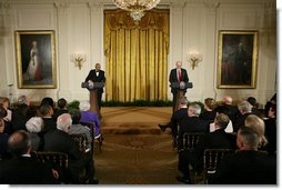 President George W. Bush and First Lady Laura Bush listen as Actor Avery Brooks, (L), and Dr. Allen Guelzo make remarks during a ceremony in the East Room of the White House honoring Abraham Lincoln's 199th Birthday, Sunday, Feb. 10, 2008.  White House photo by Chris Greenberg