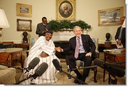 President George W. Bush and Mali President Amadou Tour meet in the Oval Office Tuesday, Feb. 12, 2008, at the White House. Said President Bush upon welcoming his fellow leader, "I was touched by the President's concern about the life of the average citizen in Mali. This is a country that's committed to the rights of its people, and we're proud to be standing side-by-side with you."  White House photo by Eric Draper