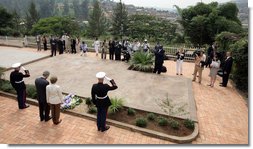 President George W. Bush and Mrs. Laura Bush pause for a moment of silence after laying a wreath on a mass grave at the genocide memorial Tuesday, Feb. 19, 2008, at the Kigali Memorial Centre in Kigali, Rwanda.  White House photo by Shealah Craighead