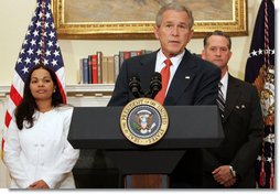 President George W. Bush is joined by Cuban political activists Miguel Sigler Amaya and his wife, Josefa Lopez Pena as he delivers a statement Friday, March 7, 2008, on the state of Cuba. Said the President, "As I told the Cuban people last October, a new day for Cuba will come. Until that day comes, the United States will continue to shine a bright and revealing light on Cuba's abuses. We will continue to tell the stories of Cuba's people, even when a lot of the world doesn't want to hear them. And we will carry this refrain in our hearts: Viva Cuba Libre." White House photo by Chris Greenberg