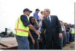 President George W. Bush meets and speaks with port workers following his remarks on U.S. trade policy Tuesday, March 18, 2008, at the Blount Island Marine Terminal in Jacksonville, Fla. White House photo by Chris Greenberg