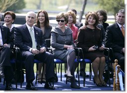 Mrs. Laura Bush and Mrs. Maria Basescu, spouse of Romanias President Traian Basescu, break out in laughter at remarks made Wednesday, April 2, 2008, during a joint press availability with their husbands at the Protocol Villas Neptun-Olimp in Neptun, Romania. White House photo by Shealah Craighead