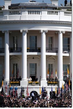 President George W. Bush and Mrs. Laura Bush stand with Pope Benedict XVI as he acknowledges the cheers from the crowd from the South Portico balcony Wednesday, April 16, 2008, on the South Lawn of the White House. White House photo by Grant Miller