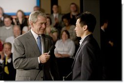 President George W. Bush takes a question from the audience following his remarks on the economy Friday, May 2, 2008, during his visit to World Wide Technology, Inc. in Maryland Heights, Mo. White House photo by Chris Greenberg