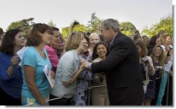 President George W. Bush greets guests at the conclusion of the Military Spouse Day celebration Tuesday, May 6, 2008, at the White House. Begun in 1984, the day was established to acknowledge the profound impact military spouses have on service members and to honor their volunteer service in educational, social and community endeavors. White House photo by Joyce N. Boghosian