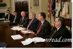 President George W. Bush is joined by Secretary of Energy Samuel Bodman, (third from left), FEMA Administrator David Paulison, (second from right), and Deputy Secretary for the Department of Homeland Security Paul Schneider, right, as he speaks to the press from the Roosevelt Room following a briefing on the latest developments concerning Hurricane Ike, Sunday, Sept. 14, 2008. White House photo by Chris Greenberg