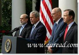 President George W. Bush stands with Federal Reserve Chairman Ben Bernanke, left, SEC Chairman Chris Cox, right, and Treasury Secretary Hank Paulson as he delivers a statement on the economy Friday, Sept. 19, 2008, in the Rose Garden of the White House. Said the President, "This is a pivotal moment for America's economy. We must act now to protect our nation's economic health from serious risk."  White House photo by Joyce N. Boghosian