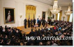 President George W. Bush addresses his remarks prior to signing H.R. 7081, The United States-India Nuclear Cooperation Approval and Nonproliferation Enhancement Act, Wednesday, Oct. 8, 2008, in the East Room at the White House. President Bush is joined on stage by, from left, Rep. Joseph Crowley, D-N.Y., Rep. Eliot Engel, D-N.Y., Secretary of State Condoleezza Rice, Sen. Chris Dodd D-Conn., Senator John Warner of Virginia, Energy Secretary Samuel Bodman, India's Ambassador to the United States Ronen Sen and Vice President Dick Cheney. White House photo by Chris Greenberg