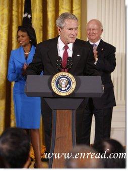 President George W. Bush welcomes guests to the East Room of the White House prior to signing H.R. 7081, The United States-India Nuclear Cooperation Approval and Nonproliferation Enhancement Act, Wednesday, Oct. 8, 2008, in the East Room at the White House. White House photo by Eric Draper