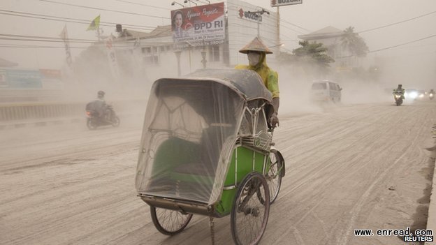 Residents wore masks to protect themselves from the dust and ash in the air