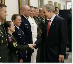 President George W. Bush greets military personnel on his visit to the Pentagon Thursday, May 10, 2007 in Arlington, Va., for a meeting with U.S. Defense Secretary Robert Gates and members of the Joint Chiefs of Staff.  White House photo by Eric Draper