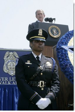 President George W. Bush addresses his remarks at the annual Peace Officers' Memorial Service outside the U.S. Capitol Tuesday, May 15, 2007, paying tribute to law enforcement officers who were killed in the line of duty during the previous year and their families. White House photo by Joyce Boghosian