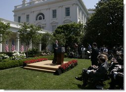 President George W. Bush responds to a reporter's question Thursday, May 24, 2007, during a morning press conference in the Rose Garden of the White House. White House photo by Joyce Boghosian