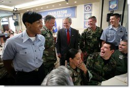 President George W. Bush spends time meeting with military personnel at a luncheon Tuesday, July 24, 2007, during the Presidents visit to Charleston AFB in Charleston, S.C. White House photo by Eric Draper