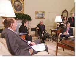 President George W. Bush meets with co-chairs of the President's Commission on Care for America's Returning Wounded Warriors, former Health and Human Services Secretary Donna Shalala and former Senator Bob Dole, left, Wednesday, July 25, 2007, joined by outgoing Veterans Affairs Secretary Jim Nicholson in the Oval Office at the White House.  White House photo by Joyce N. Boghosian