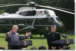 President George W. Bush, addresses the media during a joint press availability with Afghanistan President Hamid Karzai, saying,  Were working closely together to help the people of Afghanistan prosper. We work together to give the people of Afghanistan a chance to raise their children in a hopeful world. And were working together to defeat those who would try to stop the advance of a free Afghan society. White House photo by Chris Greenberg