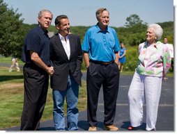 President Nicolas Sarkozy of France is welcomed to Walkers Point by President George W. Bush, former President George H.W. Bush and his wife Barbara Bush Saturday, August 11, 2007, in Kennebunkport, Maine. White House photo by Shealah Craighead