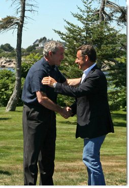 President George W. Bush greets President Nicolas Sarkozy of France upon his arrival to Walkers Point Saturday, August 11, 2007, in Kennebunkport, Maine. White House photo by Shealah Craighead