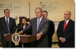 President George W. Bush is joined, from left to right, by former U.S. Senator Bob Dole and former U.S. Health and Human Services Secretary Donna Shalala, who co-chair the Presidents Commission on Care for Americas Returning Wounded Warriors; Secretary of Veterans Affairs Jim Nicholson and Fernando O. Rivera, director of the Washington D.C. Veterans Affairs Medical Center, Monday, Aug. 13, 2007 at the medical center, as President Bush addresses his remarks on the commissions findings and the implementation of their recommendations to offer the best care possible to the nations veterans.  White House photo by Chris Greenberg