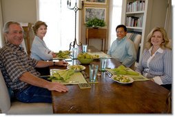 President George W. Bush and Mrs. Laura Bush sit with U.S. Attorney General Alberto Gonzales and his wife, Rebecca, during a visit Sunday, Aug. 26, 2007, at the Bush Ranch in Crawford, Texas. The Attorney General's resignation was announced Monday morning. In a statement, the President said, "Al Gonzales is a man of integrity, decency and principle. And I have reluctantly accepted his resignation, with great appreciation for the service that he has provided for our country." White House photo by Chris Greenberg