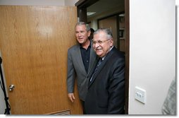 President George W. Bush escorts Iraqi President Jalal Talabani before the start of his meeting with the Iraqi National Leadership at Al Asad Airbase, Al Anbar Province, Iraq, Monday, September 3, 2007. White House photo by Eric Draper