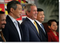 President George W. Bush smiles as he stands for a group photo with Southeast Asian Leaders Friday, Sept. 7, 2007, following a luncheon at the InterContinental in Sydney. Standing with him are Prime Minister Lee Hsien Loong of Singapore, left, Noer Hassan Wirajuda, Indonesian Minister of Foreign Affairs, and President Gloria Macapagal-Arroyo of the Philippines. White House photo by Eric Draper