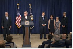 President George W. Bush speaks during the swearing-in ceremony of Jim Nussle as the Director of the Office of Management and Budget in the Dwight D. Eisenhower Executive Office Building Monday, Sept. 10, 2007. Standing with Director Nussle is his wife Karen Nussle, his daughter Sarah and his son Mark. "It's our responsibility to ensure that we run our government wisely and to spend the people's money wisely. Jim Nussle understands that. He also understands that cutting taxes has helped our economy grow," said President Bush. White House photo by Chris Greenberg